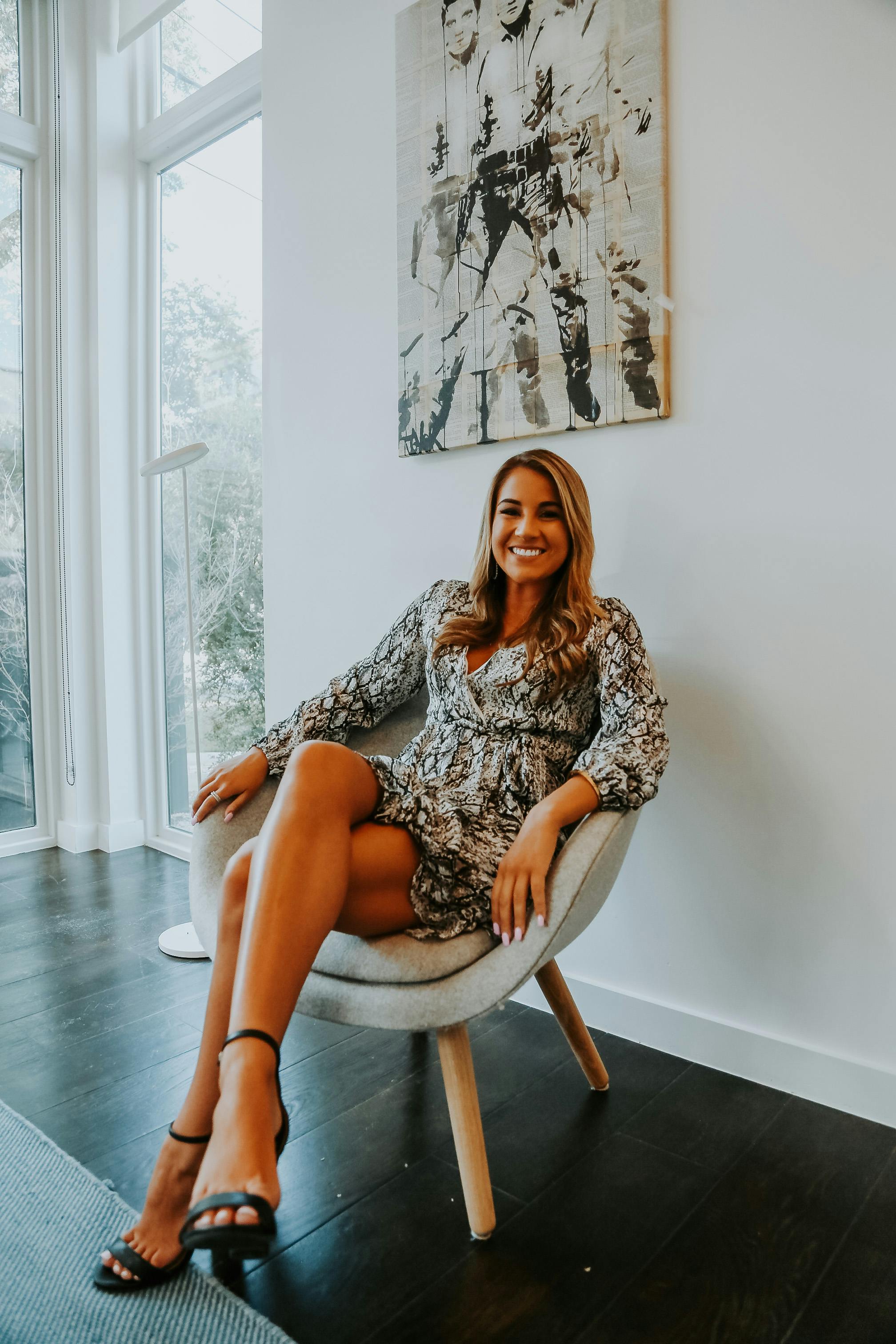 Stylish woman sitting on chair · Free Stock Photo