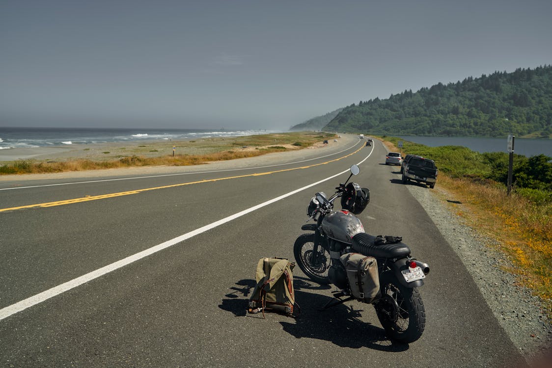 Black Motorcycle Parked on Road