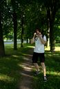 Young man taking photo in summer outfit