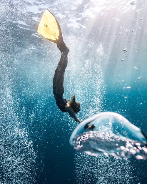 Photograph of a Woman Scuba Diving