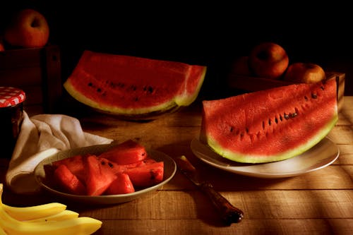 Free Photograph of Slices of Watermelon on Plates Stock Photo