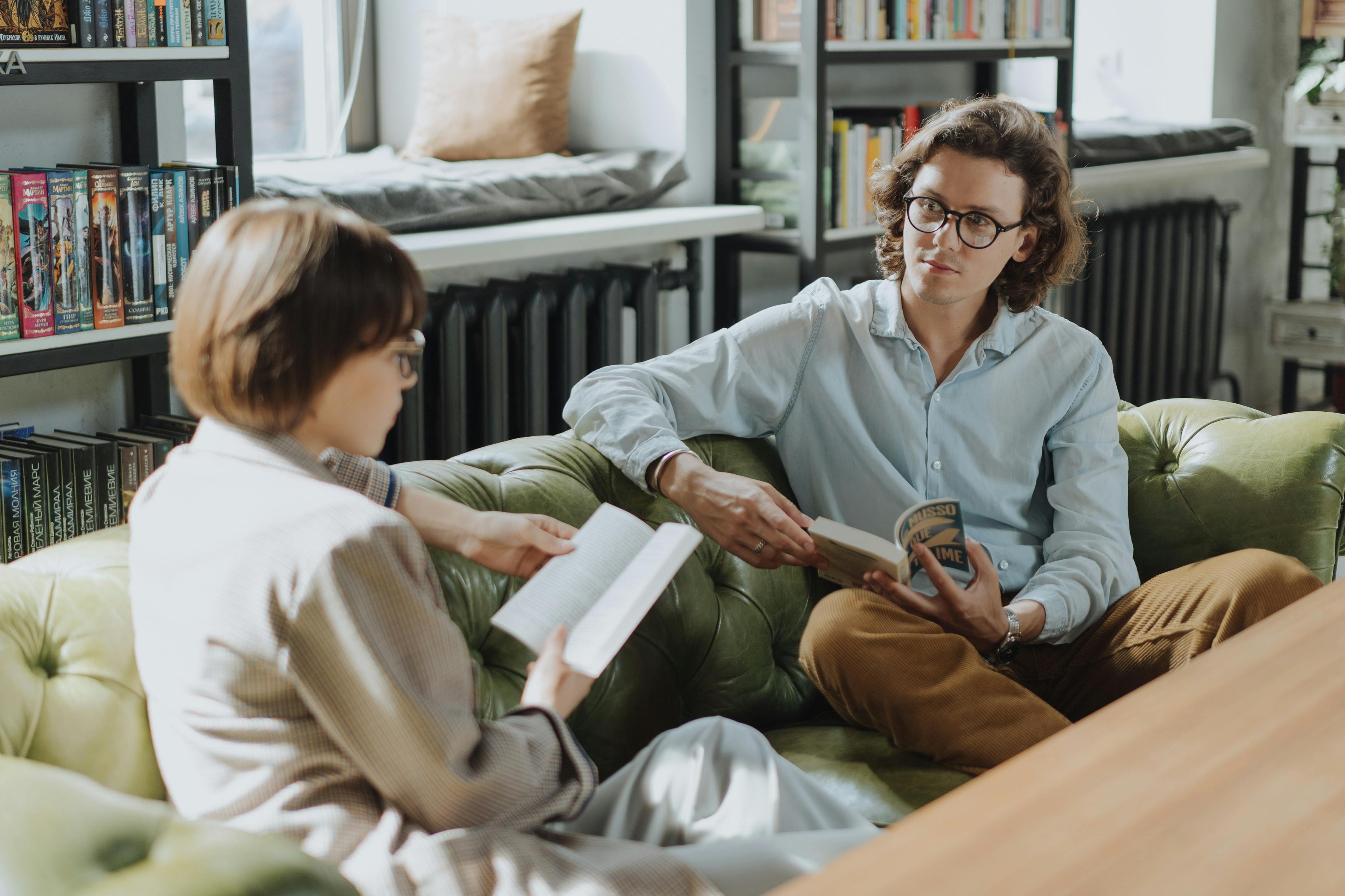 woman in gray robe reading book