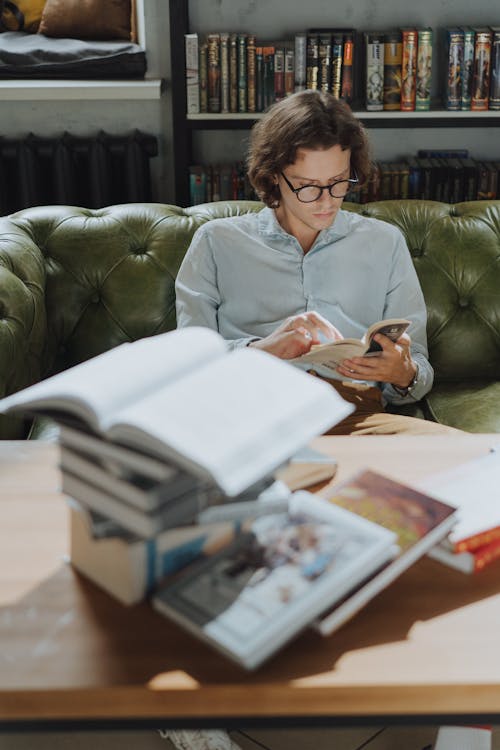 Woman in Gray Blazer Reading Books