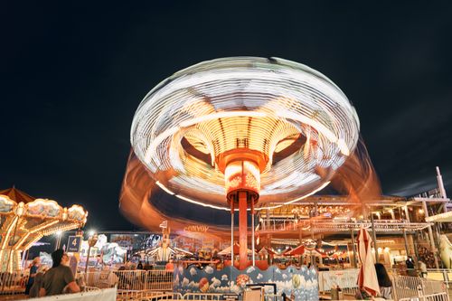 Free Colorful long exposure of a carousel at night in Wildwood, NJ amusement park. Stock Photo