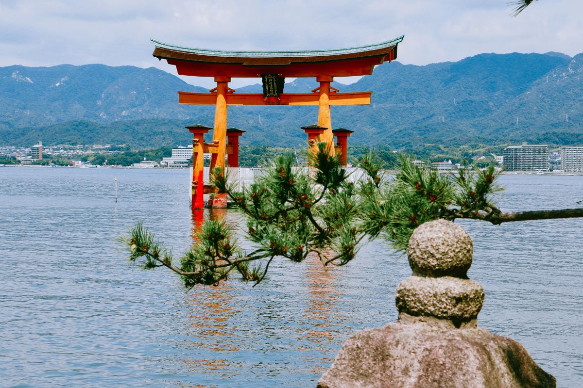 Wide view of the floating Otorii gate and Itsukushima Shrine at high tide, Seto Inland Sea