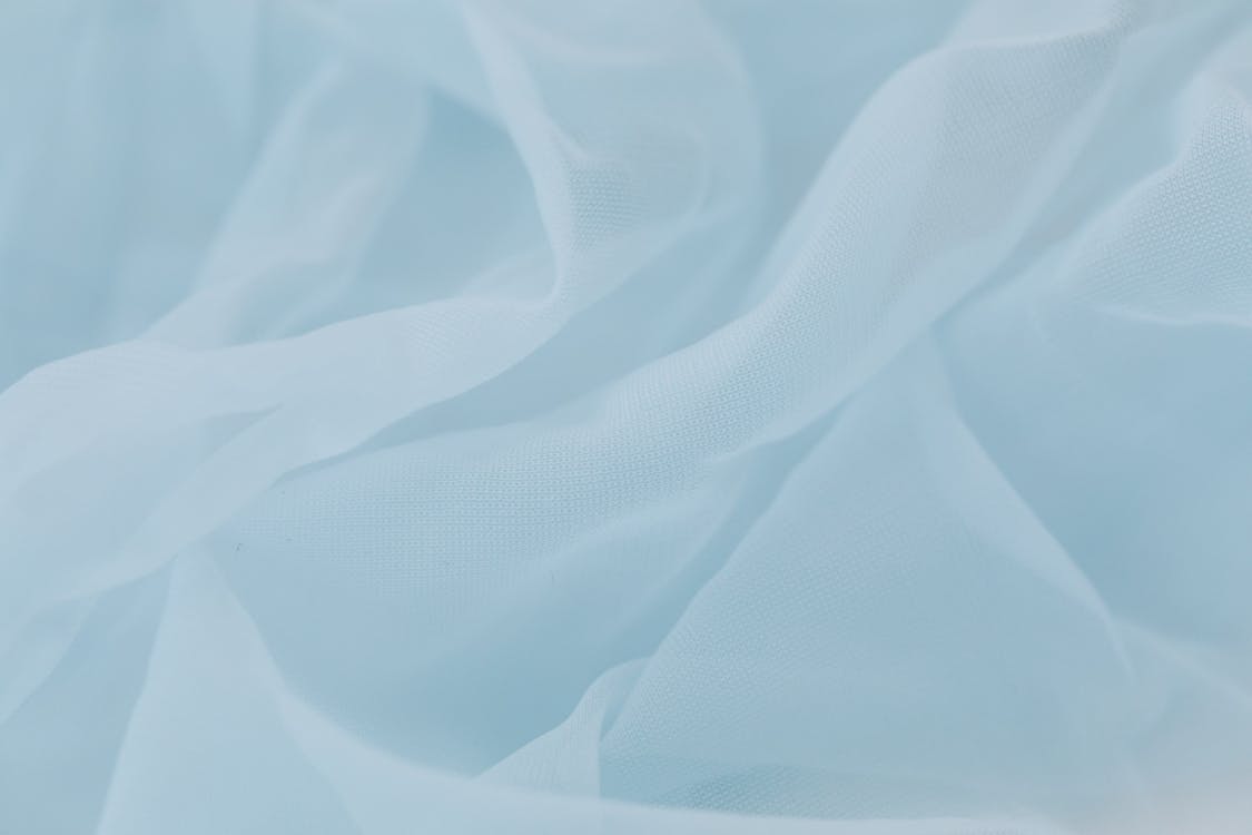 Close Up Shot of Rippled Baby Blue Cloth