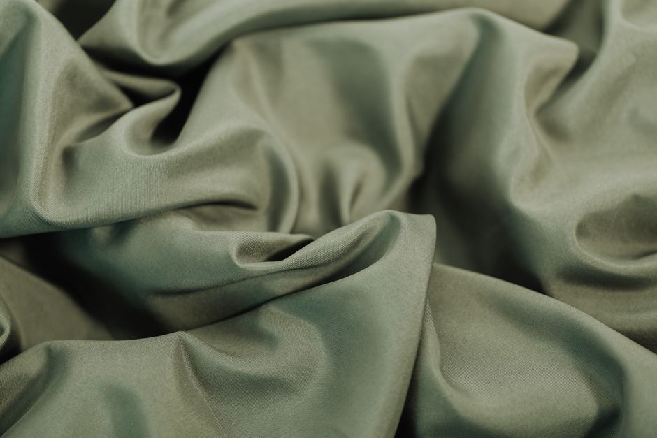 Close-up of technical bivy fabrics showing ripstop patterns and mesh - ultralight bivy bag Close-up of technical bivy fabrics showing ripstop patterns and mesh - ultralight bivy bag