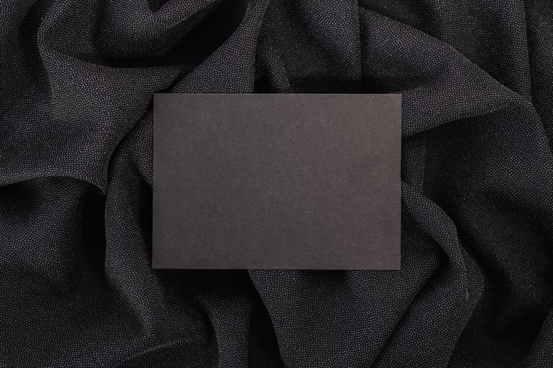 Blank matte card on dark fabric — kaboompics.com on Pexels