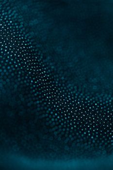 Captivating macro shot of textured blue fabric showcasing intricate details and patterns.