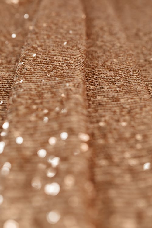 Close-up of a Material with Golden Sequins