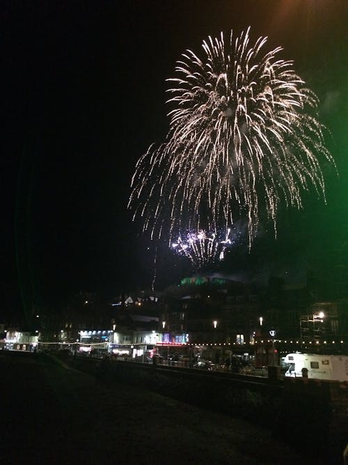 Free stock photo of fireworks, mc cain s tower, oban fireworks