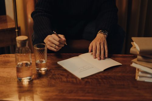 Notebook and writing tools, photographed by cottonbro studio on Pexels