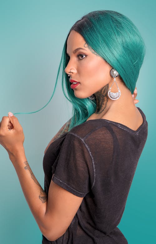 Free 
A Tattooed Woman with Dyed Hair Stock Photo