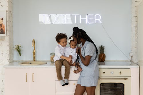 Free Mother and Children in Kitchen Stock Photo