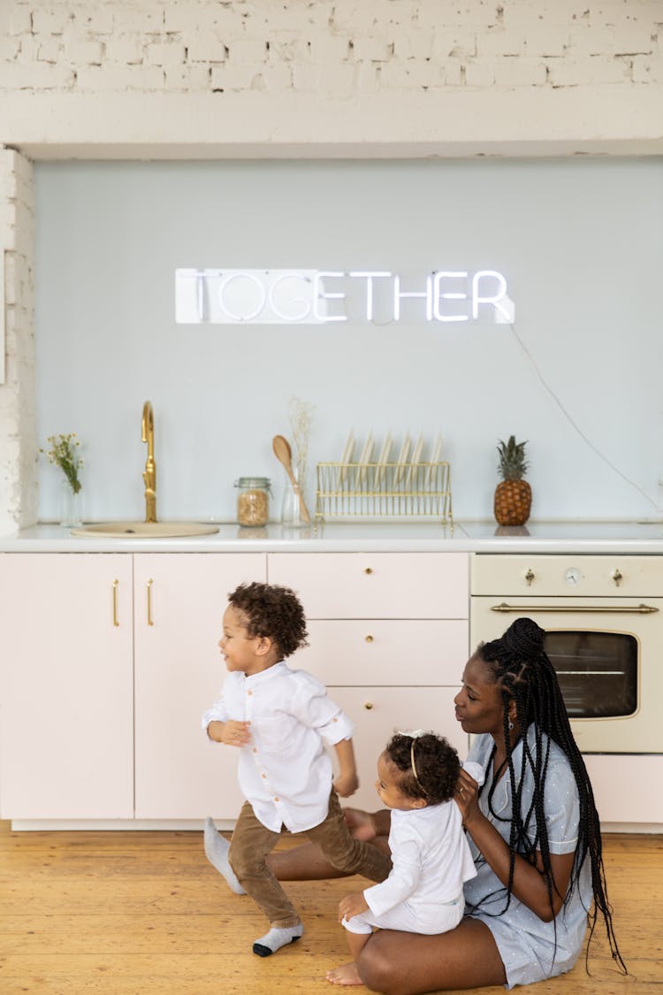 Mother And Children Playing Together