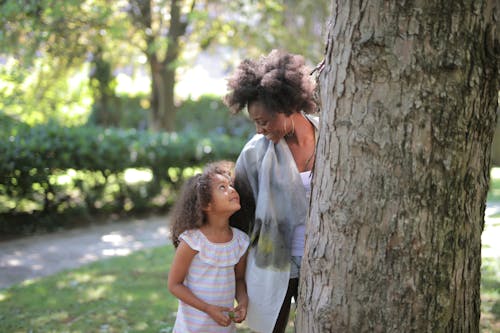 Mother and Daughter by Tree