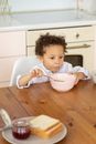Child Eating from Bowl