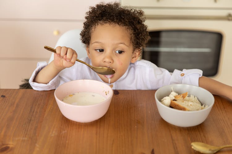 Little Boy Eating Cereal