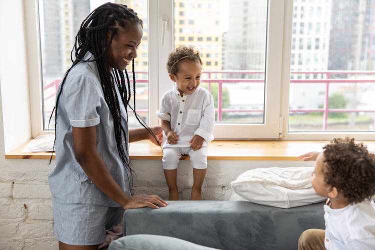 Smiling Family In Room