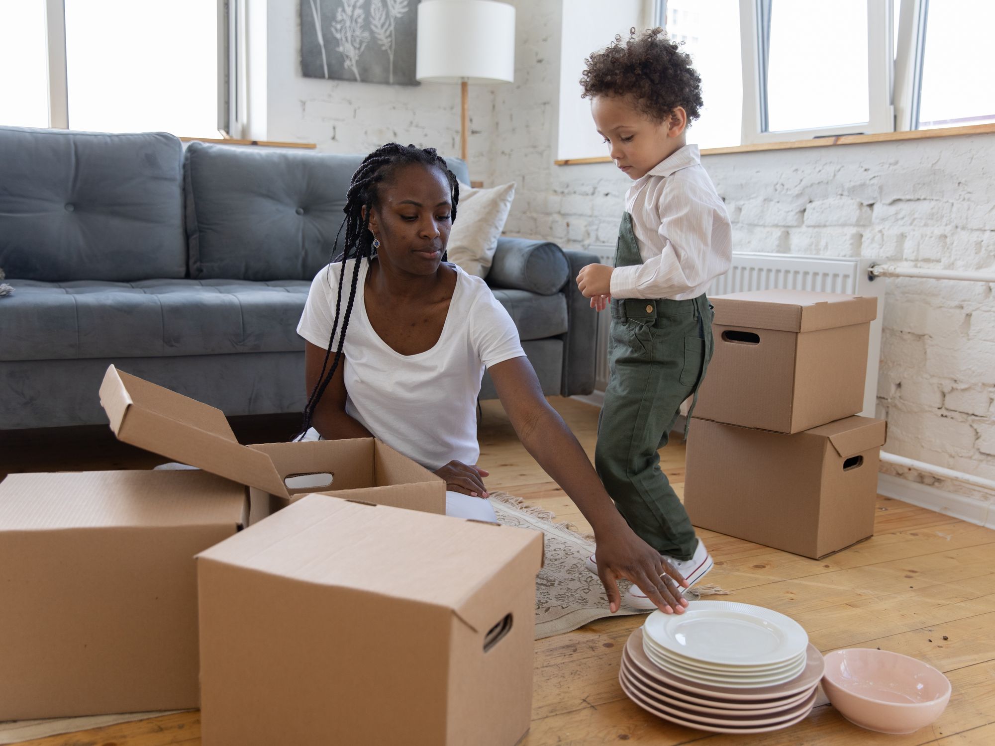 Flat Removals in Markyate, South East — movers carrying boxes for a flat move