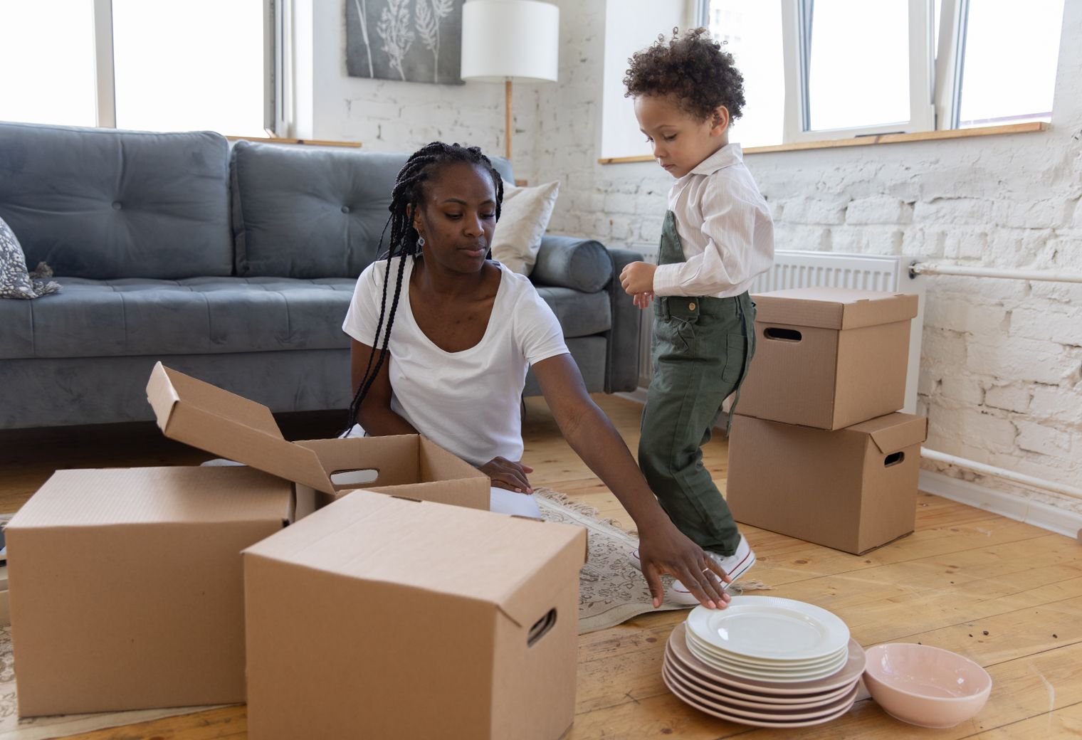 Stratton — professional packers wrapping and boxing belongings