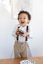 Girl in White Button Up Shirt Holding Chocolate Ice Cream
