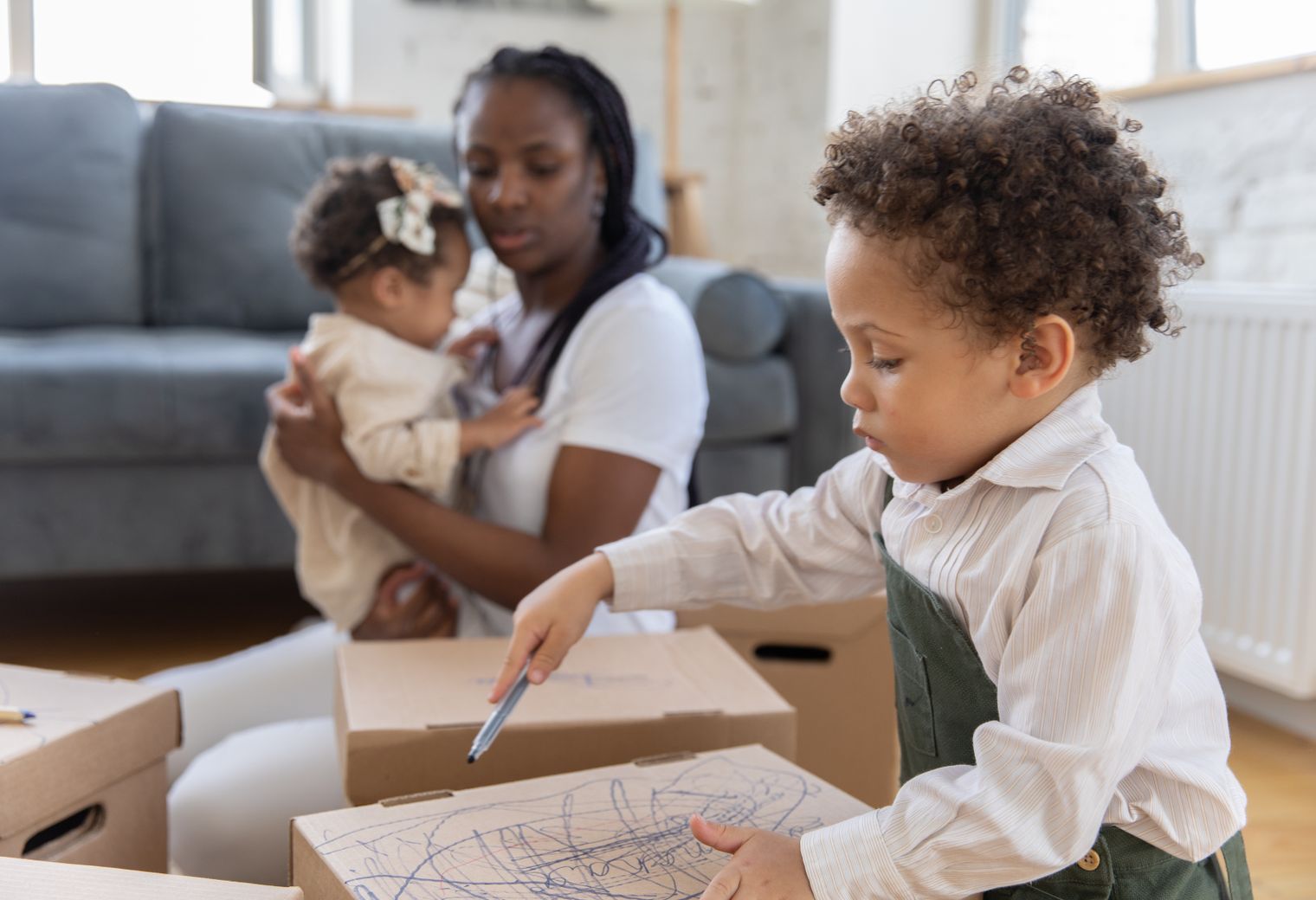 Cherry Burton — professional movers carrying furniture on a house move