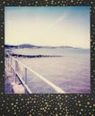 White Metal Railings Near Sea