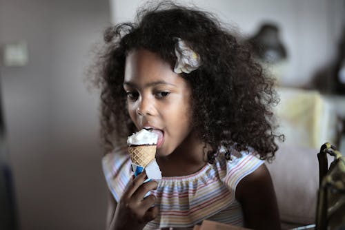 Cute Girl having an Ice Cream 