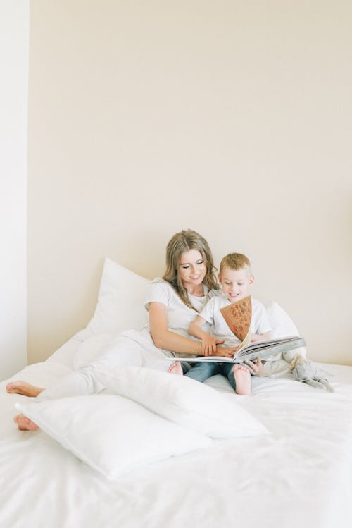 Free Mother And Child On The Bed Stock Photo