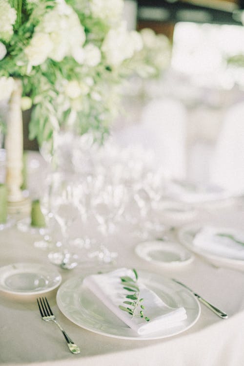 White Ceramic Plate On Table