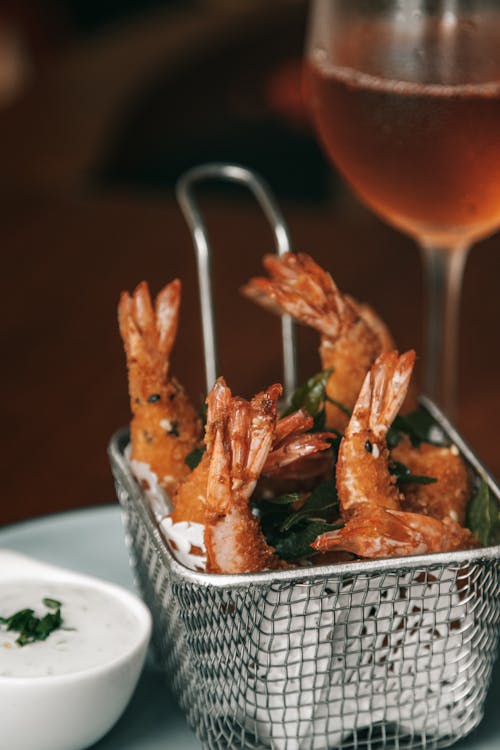 Free Fried Shrimp on Stainless Steel Tray Stock Photo