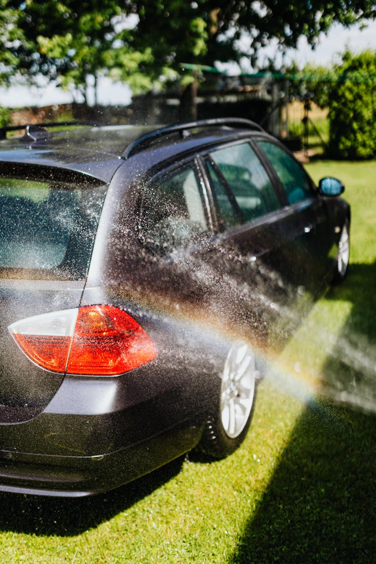 Washing Of Black Car In Tilt Shift Lens