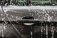 Black Car with Soap Bubbles