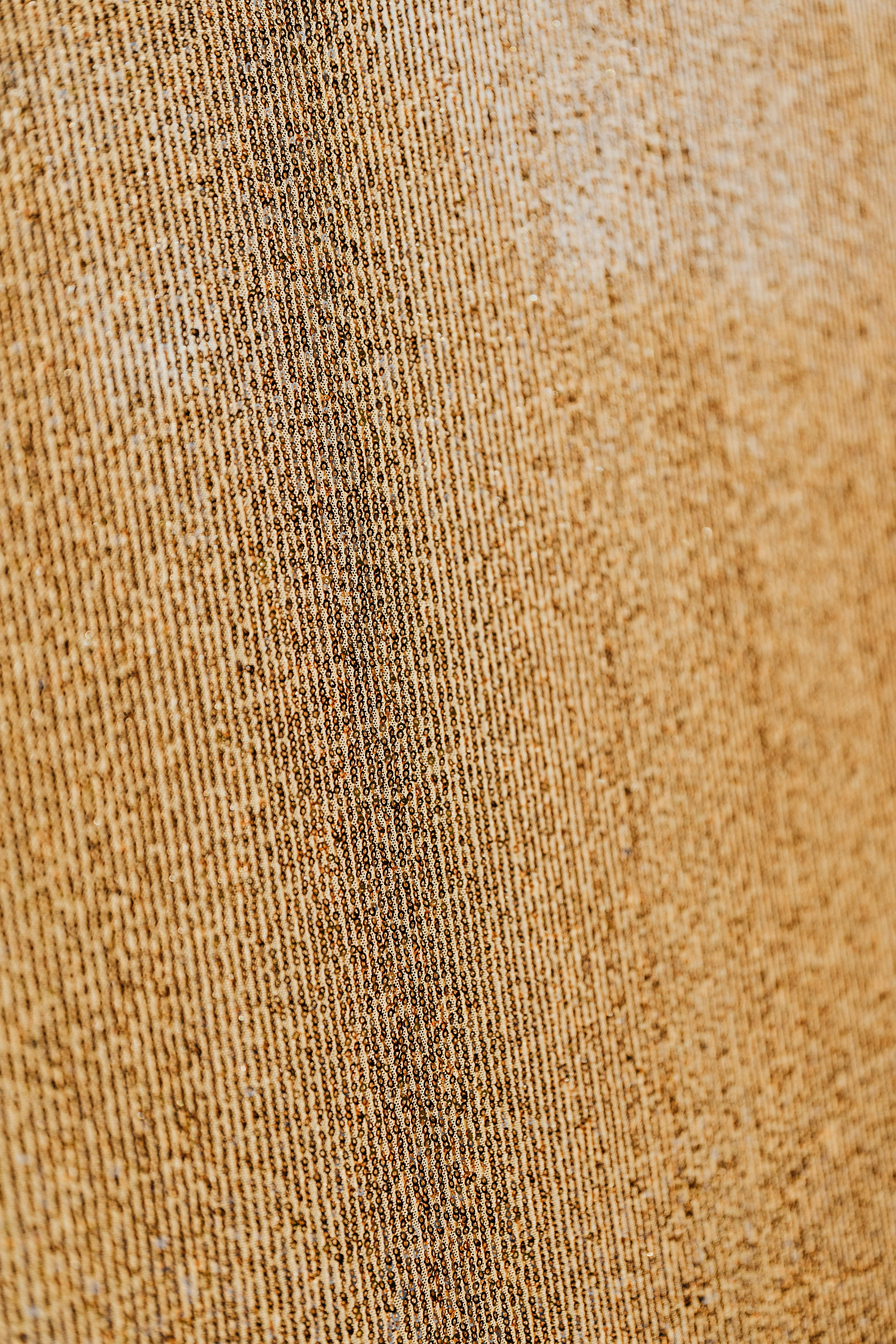 brown textile in close up photography