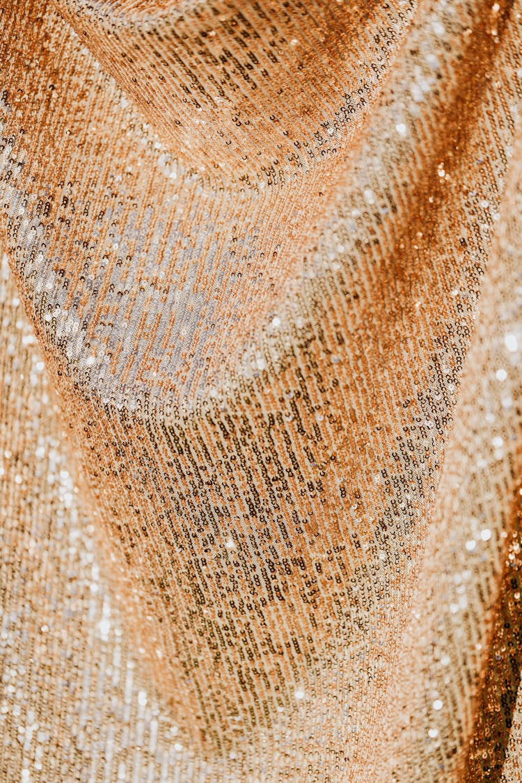 Brown Textile With Golden Sequins