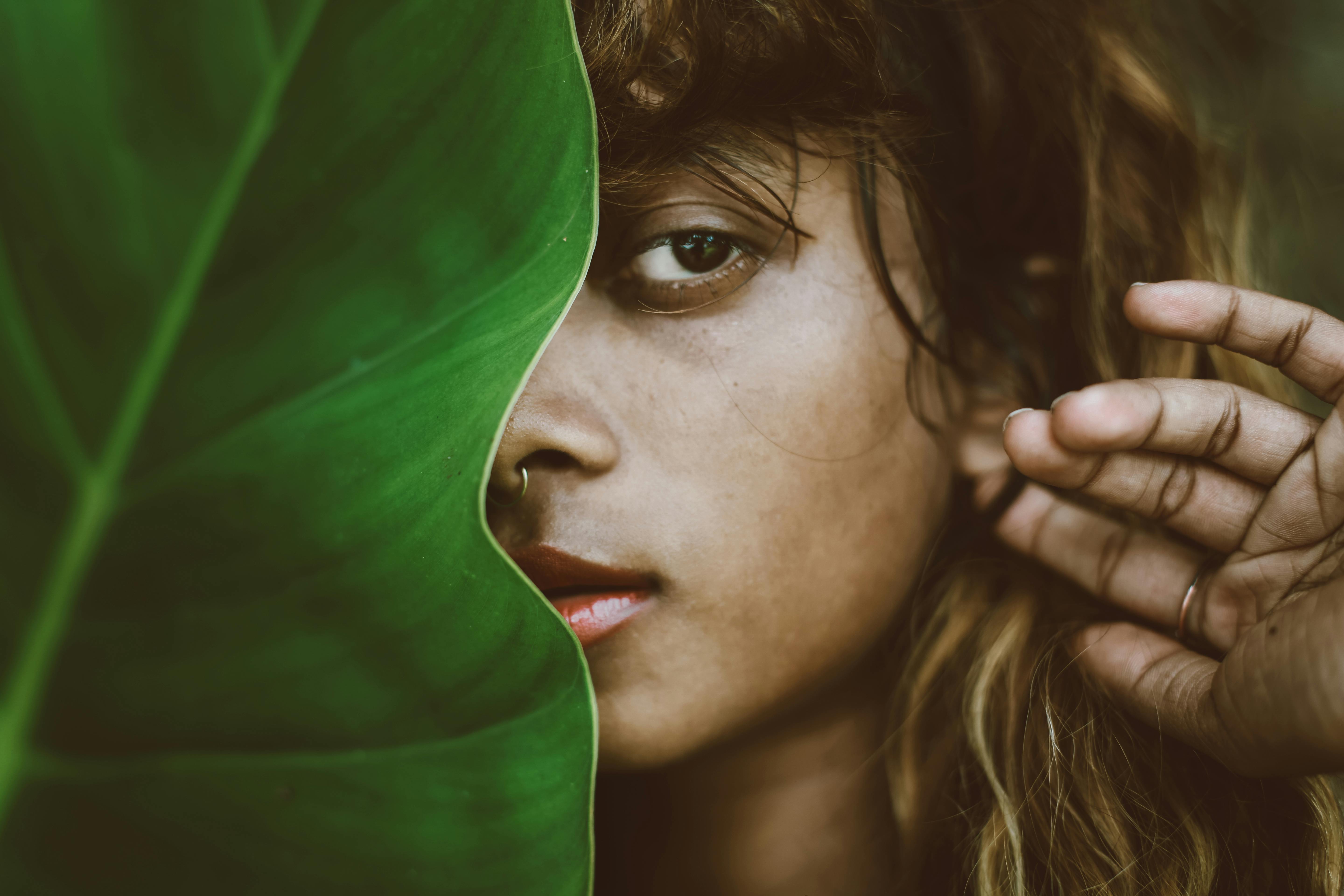 Close-up Portrait Photo of Woman Posing With Her Hand by Her Face · Free  Stock Photo