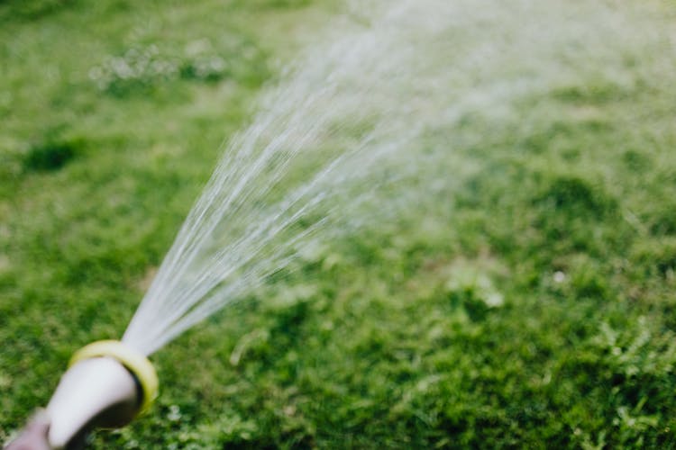 Photo Of Water Coming Out Of A Spray Hose