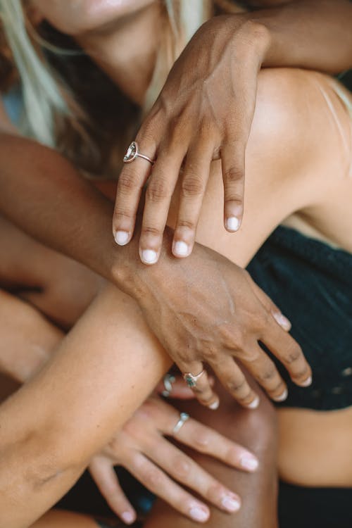 Free Close-up Photo of Hands with Silver Rings  Stock Photo