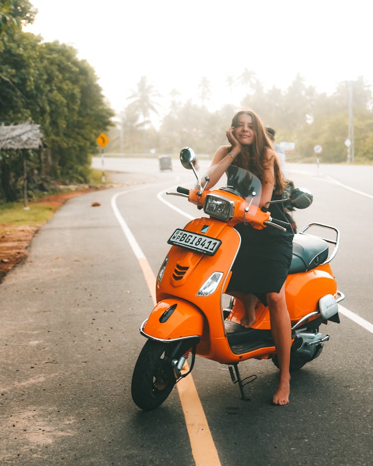 Woman On Scooter