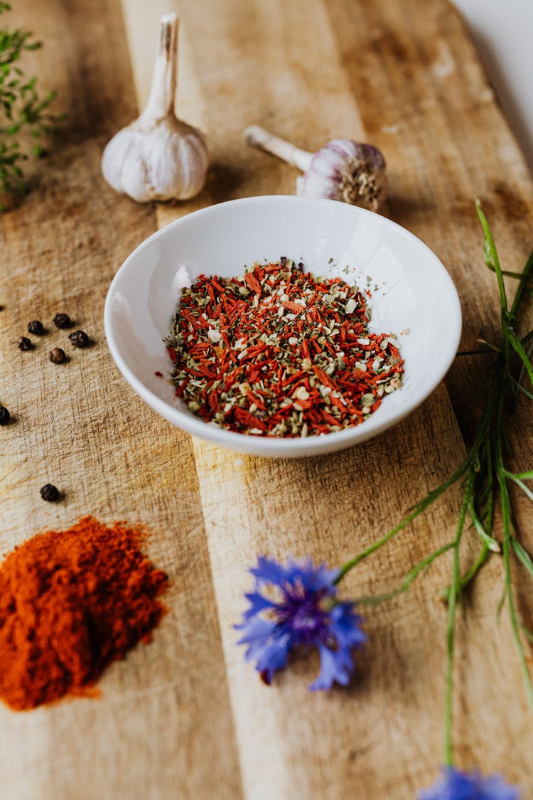 Herbs And Spices In A Ceramic Bowl