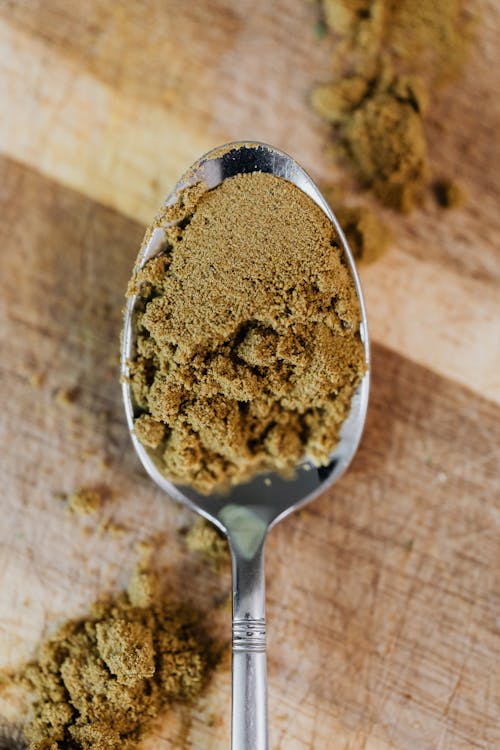 Brown Powder on Stainless Steel Spoon