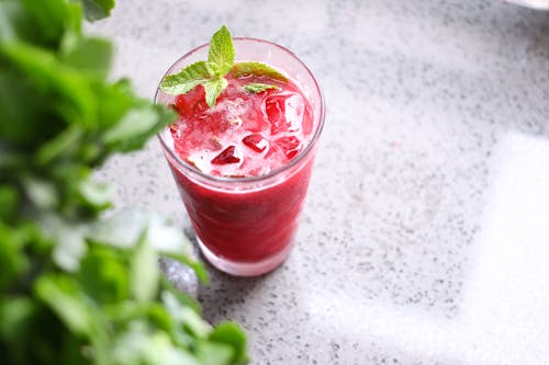 Free Mint Leaves Garnished on a Fruit Juice Stock Photo