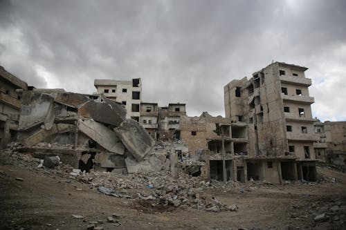 Old abandoned building under cloudy sky