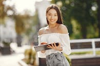 Brunette Woman with Tablet