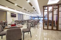 Spacious Restaurant Room with Gray Chairs