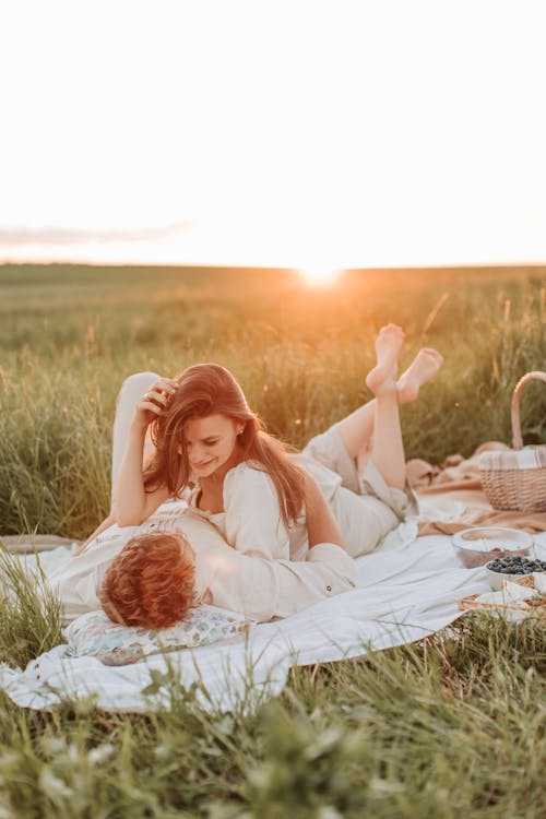 Free Close-Up Shot of a Couple Lying Down Together Stock Photo