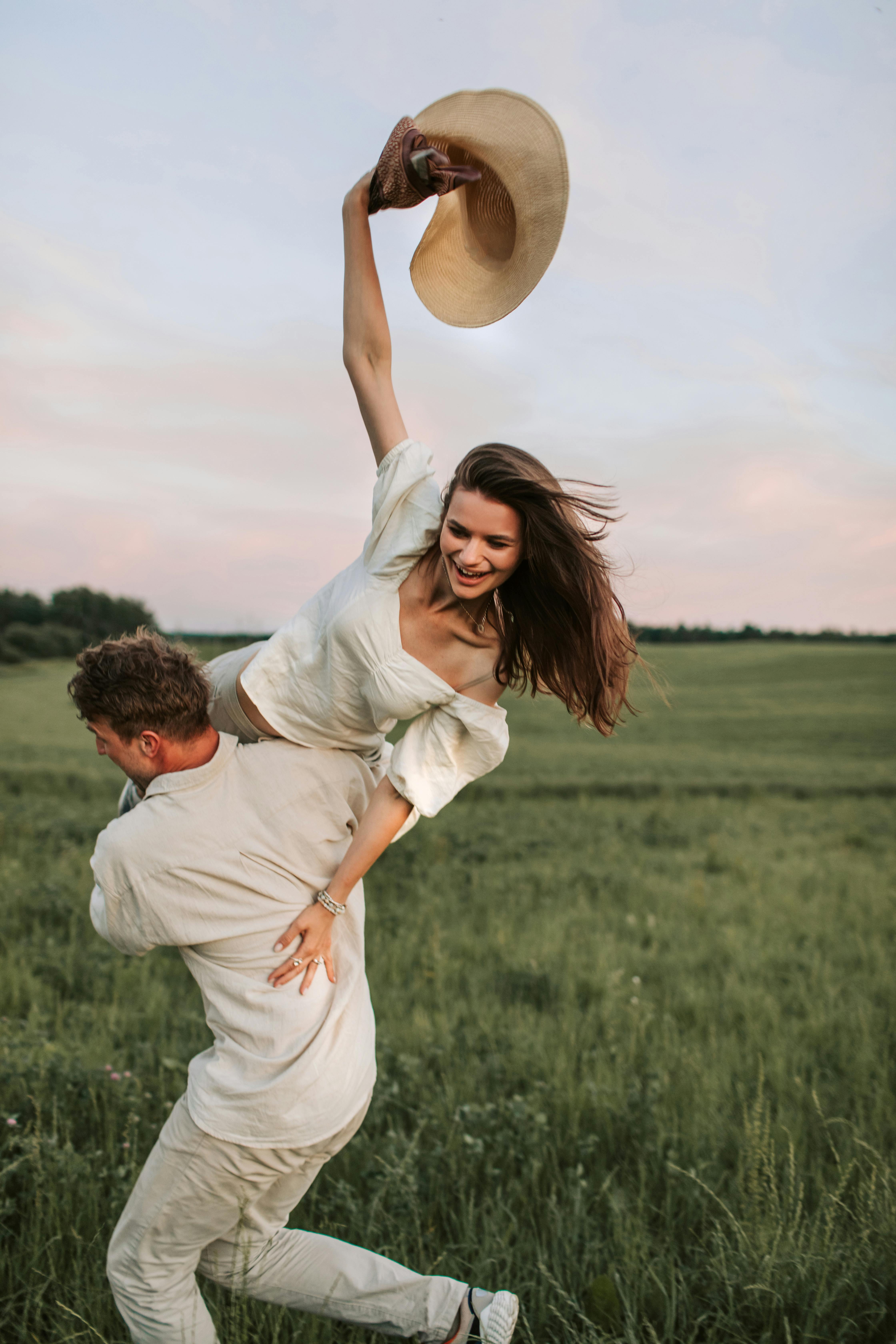 a man carrying his partner