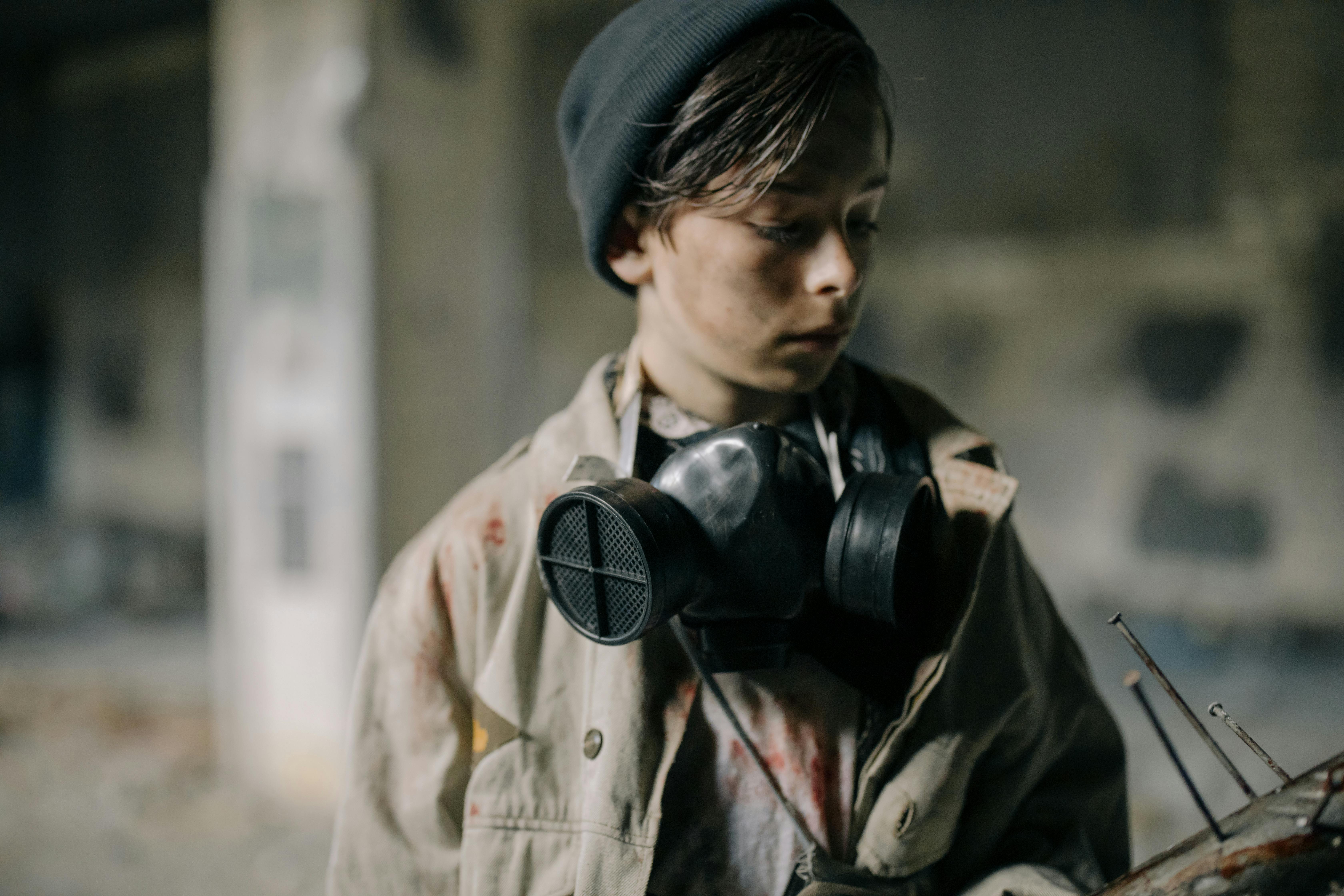 man in brown coat using black dslr camera