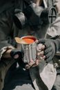 Person Holding White and Black Ceramic Mug